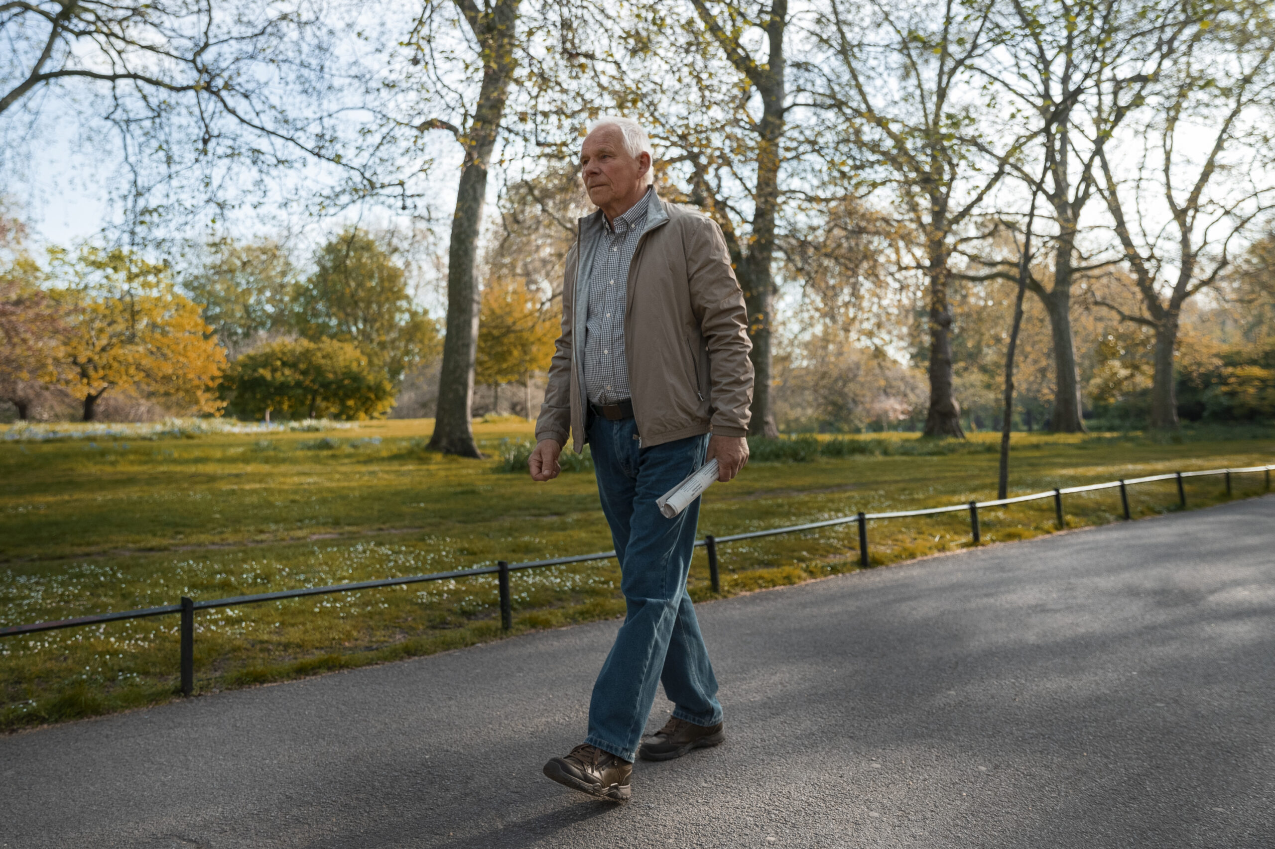 Full shot old man taking stroll